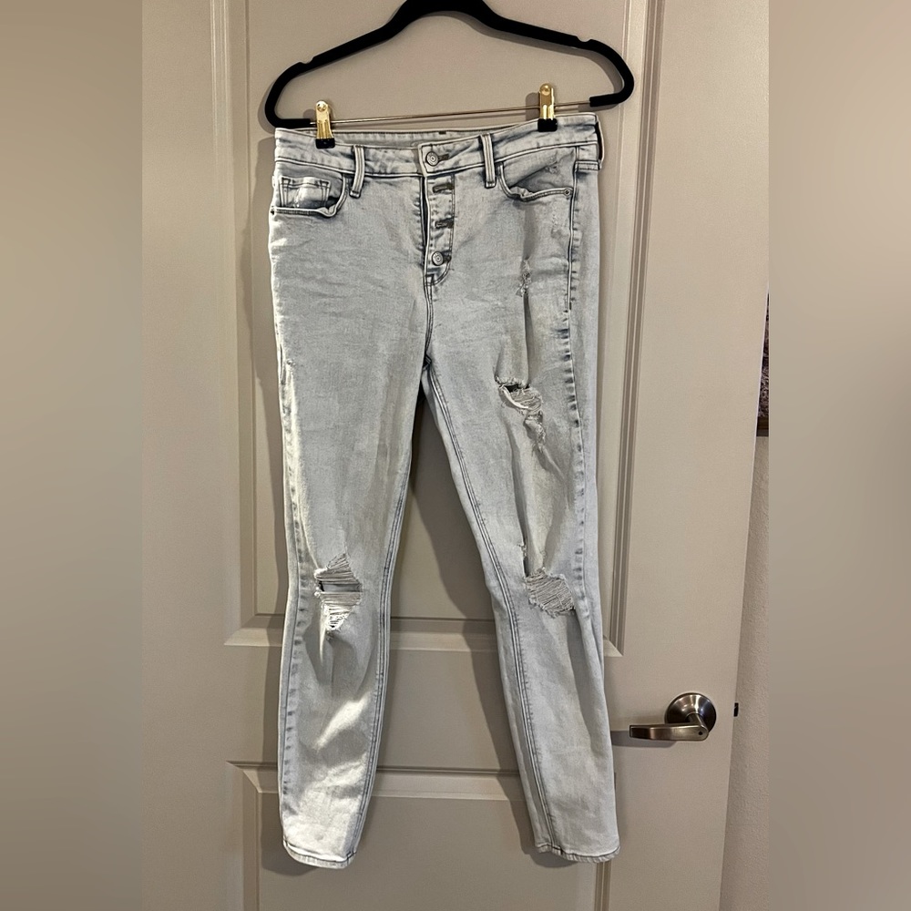 High Rise Super Skinny Rockstar Jeans Size 10 in Distressed Light Wash